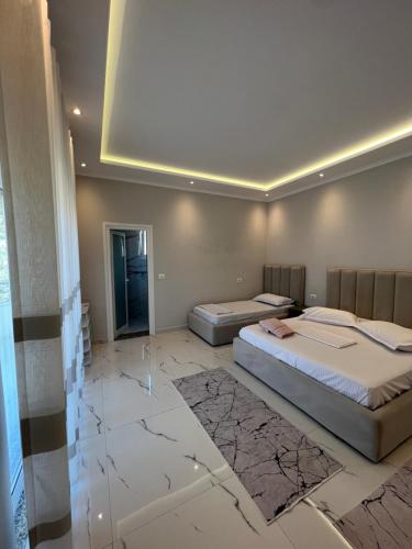 Guesthouse BellaVistaにあるベッド