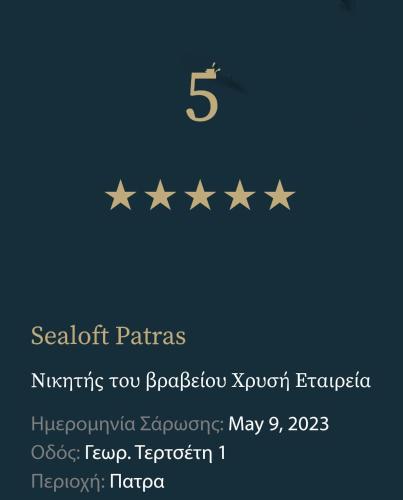 a poster with five stars on a blue background at Sealoft in Patra