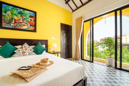 Postel nebo postele na pokoji v ubytování Coco Viet Homestay