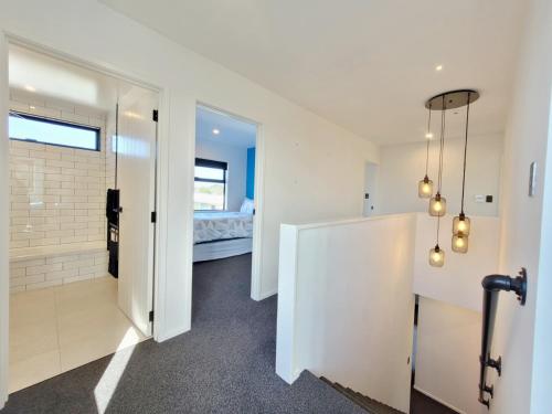 Φωτογραφία από το άλμπουμ του Hosts on the Coast Hillview Hideaway σε Waihi Beach