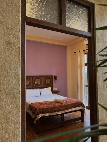 Postel nebo postele na pokoji v ubytování Onilwe Resort Weligama