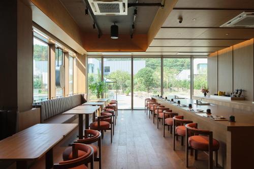 Restaurant ou autre lieu de restauration dans l'établissement Ananti at Busan Village