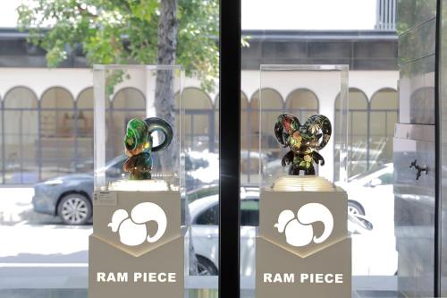 two trophies are on display in a window at Boda Hotel in Taichung