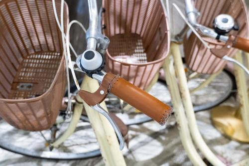 a close up of a bike with wicker chairs at Boda Hotel in Taichung