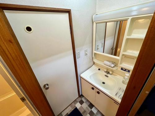 Koupelna v ubytování Apartment Hotel 下野