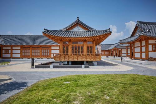 a building with a pavilion in the middle of a courtyard at Hanok Stay Namwonyechon by Kensington in Namwon
