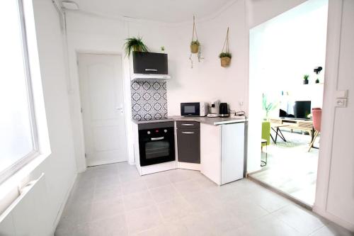 Dapur atau dapur kecil di Sublimé 1, Beau duplex en RDC