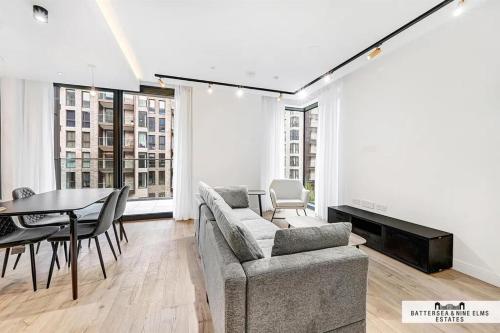 a living room with a couch and a table at 250 City Road 2 Bollinder Place EC1V 2AH 2bed LUXURY apartments-this is full address in London