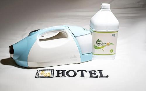 a gallon of water next to a hotel bottle at Mokpo Myeongpum Hotel in Mokpo