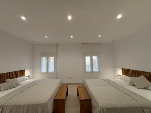 Postel nebo postele na pokoji v ubytování Casa Martí