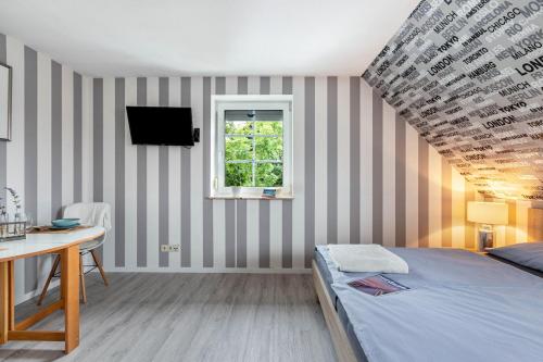 Ένα ή περισσότερα κρεβάτια σε δωμάτιο στο Gästezimmer mitten in Mittelangeln