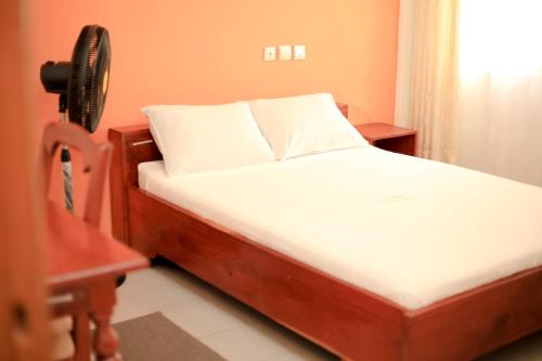 Postel nebo postele na pokoji v ubytování Stella Maris Hotel