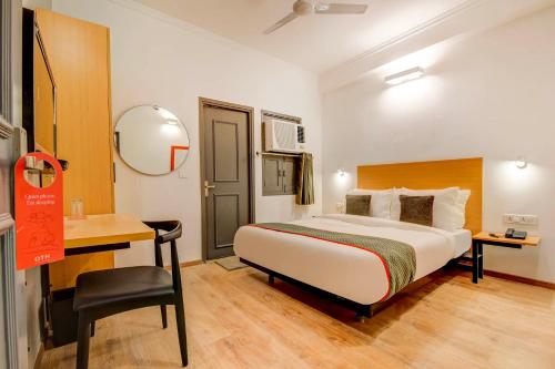 Postel nebo postele na pokoji v ubytování Hotel O Star Key