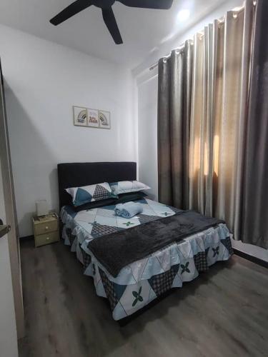 Postel nebo postele na pokoji v ubytování Putrajaya AQ Homestay (Near PICC)