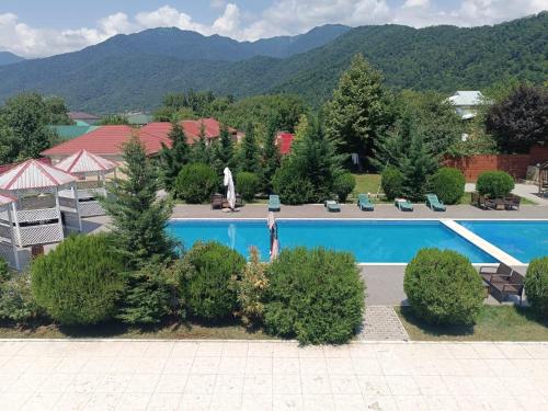 an aerial view of a resort with a swimming pool at Gabala Bliss Inn Hotel and Restaurant in Gabala
