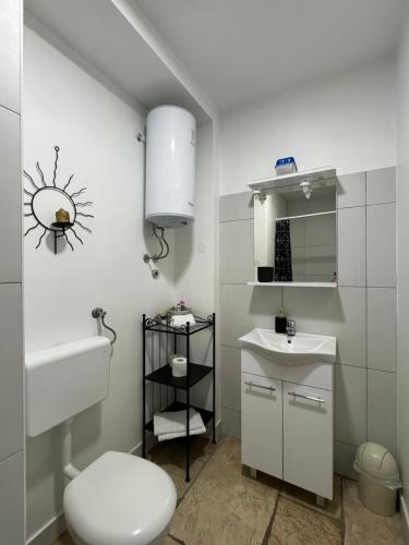 Kúpeľňa v ubytovaní Apartmani N.May's