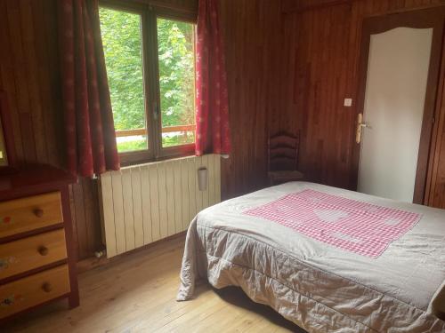 Postel nebo postele na pokoji v ubytování Chalet Les Airelles