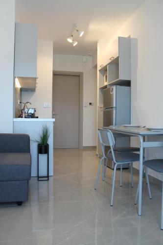 Η κουζίνα ή μικρή κουζίνα στο AK Apartments Ioa