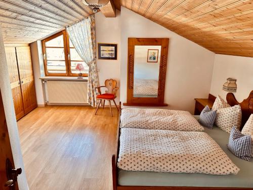 Ferienwohnungen Arnikaにあるベッド