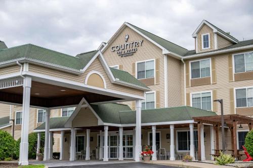 a rendering of the front of a hotel at Country Inn & Suites by Radisson, Queensbury - Lake George , NY in Lake George