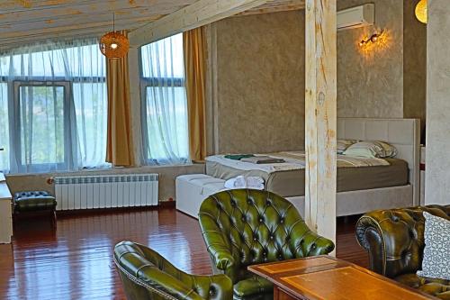 Ένα ή περισσότερα κρεβάτια σε δωμάτιο στο Holiday House Kubrat