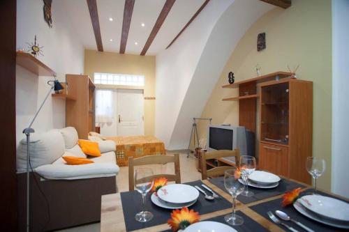 Televízia a/alebo spoločenská miestnosť v ubytovaní Casita privada con encanto en la playa de Valencia