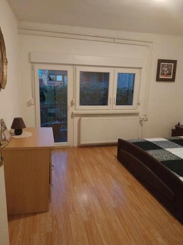 Ένα ή περισσότερα κρεβάτια σε δωμάτιο στο Apartma Laganini