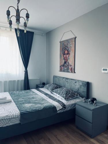 Ένα ή περισσότερα κρεβάτια σε δωμάτιο στο Apartament acasă