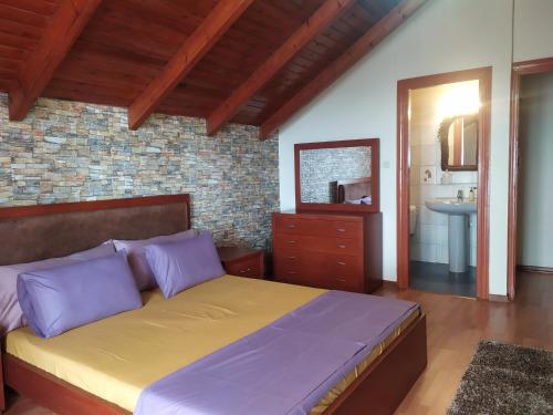 Ένα ή περισσότερα κρεβάτια σε δωμάτιο στο Agnadema House