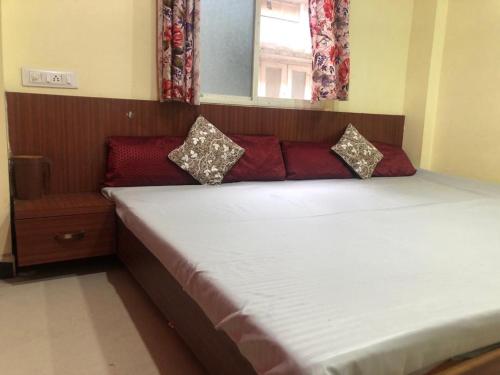 Katil atau katil-katil dalam bilik di New Yanti Guest House