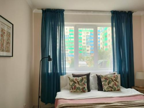 Katil atau katil-katil dalam bilik di ЖК Шугыла Apartment