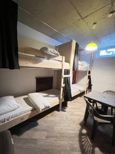 Postel nebo postele na pokoji v ubytování MoonLight Hostel