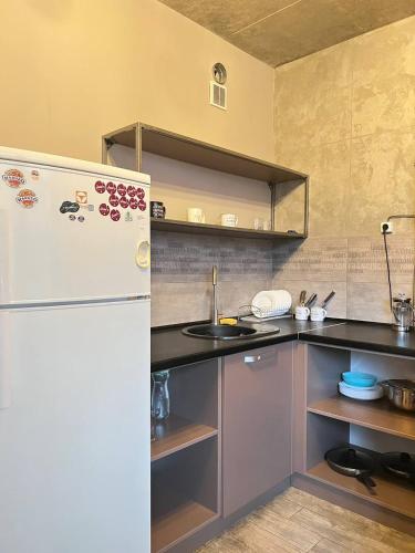 Kuchyň nebo kuchyňský kout v ubytování MoonLight Hostel