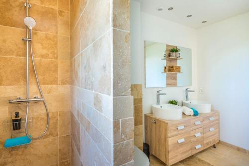 a bathroom with a shower and a sink at Villa Mas des Lavandes by Villa Plus in Le Tignet