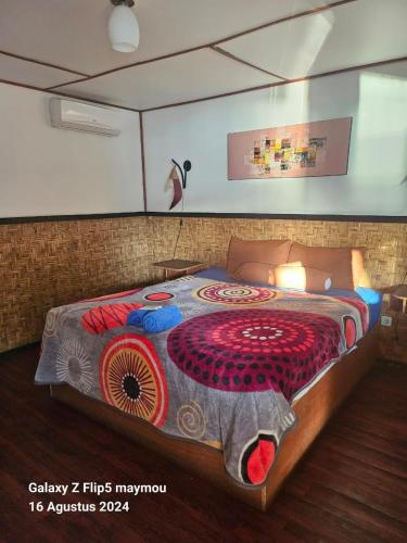 Кровать или кровати в номере Rahayu homestay sekotong