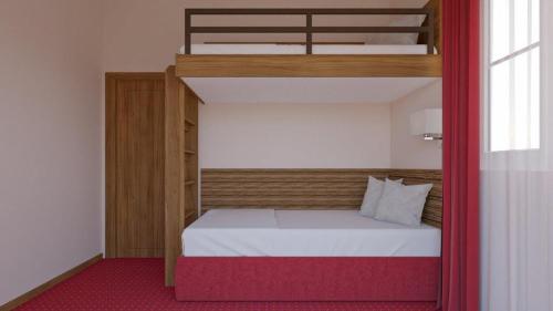 Postel nebo postele na pokoji v ubytování EA Hotel Sonata