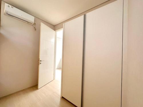 an empty room with a closet and a door at Charming 4BR House in Northwest Park, West Surabaya by Le Ciel Hospitality in Surabaya