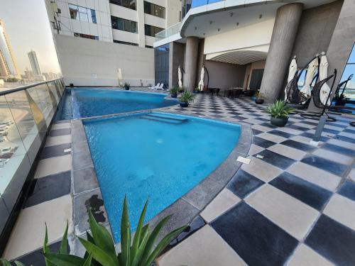 Πισίνα στο ή κοντά στο Seef Serenity - Sea & City Views