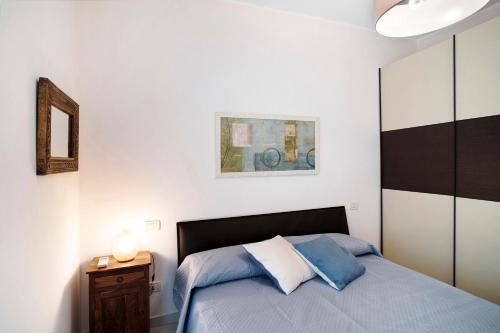 Ένα ή περισσότερα κρεβάτια σε δωμάτιο στο Casa Marte - Alassio