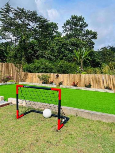 a soccer net with a ball on top of it at The Black & White Box Villa - Genting Highland Foot Area in Bentong