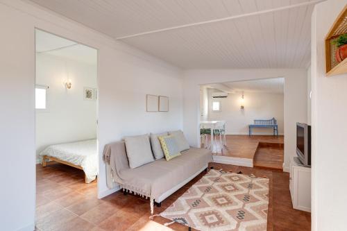 Ένα ή περισσότερα κρεβάτια σε δωμάτιο στο Além Monte Retreat, Peaceful Hideaway on the Alentejo Coast