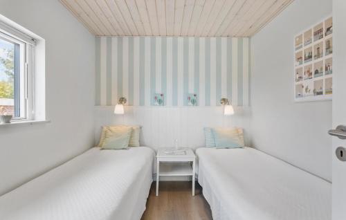 Ένα ή περισσότερα κρεβάτια σε δωμάτιο στο 2 Bedroom Cozy Home In Skårup Fyn