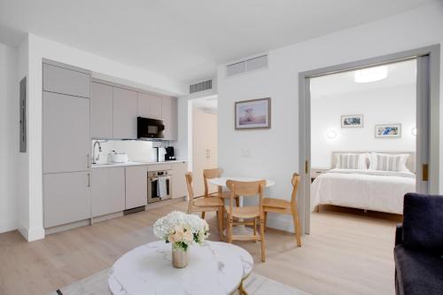 a living room with a kitchen and a bedroom at Vonder Miami Beach - Unit 7 in Miami Beach