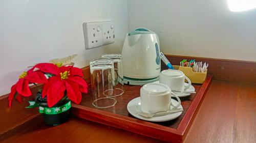 Příslušenství pro přípravu čaje a kávy v ubytování Sigiri Lanka Resort
