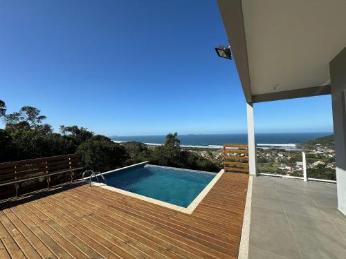 Swimmingpoolen hos eller tæt på Paraíso do Coral - Vista Mar - Garopaba - SC