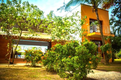Taman di luar Villas Mamilú, entrada y salida 100 por ciento flexible