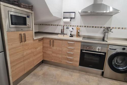 Dapur atau dapur kecil di Casa Riu Nou