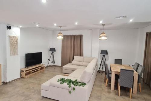 Televisyen dan/atau pusat hiburan di Casa Riu Nou