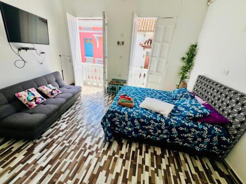 Posezení v ubytování Hostal Badillo SV