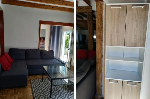 un salon avec un canapé bleu et une table en verre dans l'établissement Maison indépendante, à Boutigny-sur-Essonnes